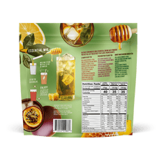 Back view of FlavCity Anytime Essentials Drink Mix Tea pouch showing nutrition facts, ingredients list, preparation instructions, and product branding on a green and white background.