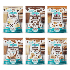 Six single-serve packets from the FlavCity Cafe Latte Variety Pack are shown: Vanilla, Chocolate Chunk Mocha, Salted Caramel Macchiato, Cinnamon Dolce, Brown Sugar Instant, and Sweet Almond Drop lattes.