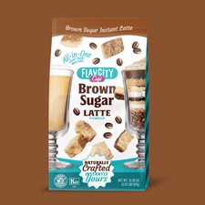 FlavCity Café Brown Sugar Latte powder bag, showing instant latte mix, brown sugar cubes, and coffee beans