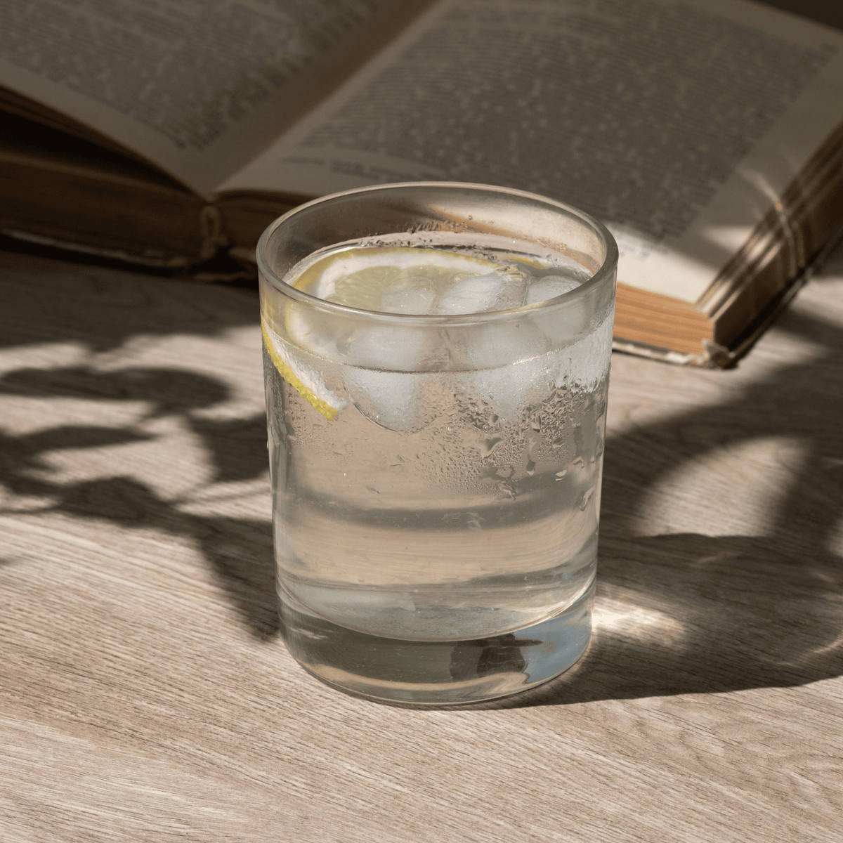 A glass of water with ice cubes.