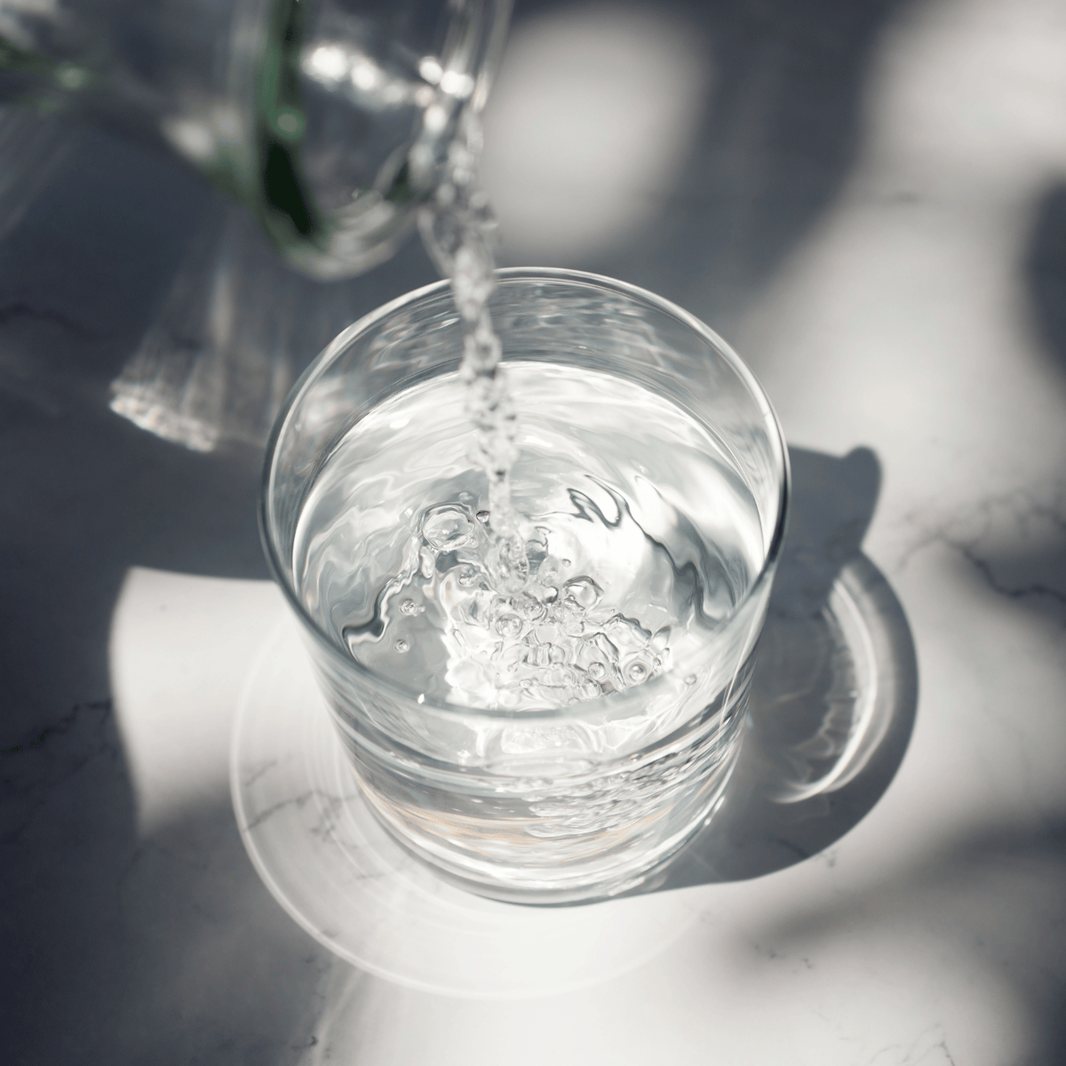 A glass of water.