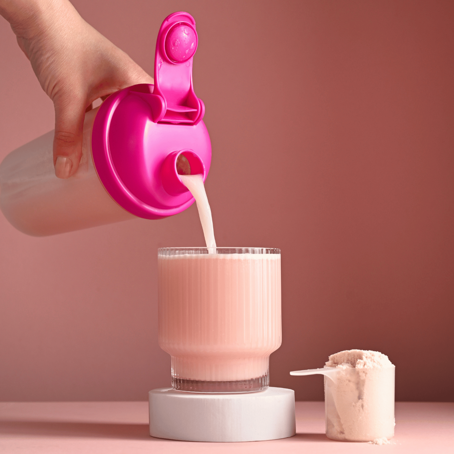 A protein shake being transferred.