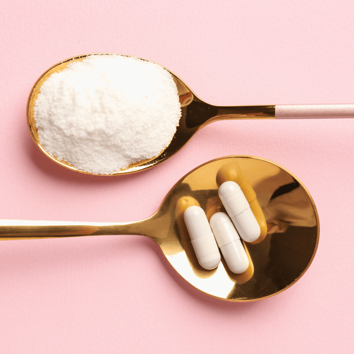A spoon of collagen powder and three tablets of collagen on a spoon.