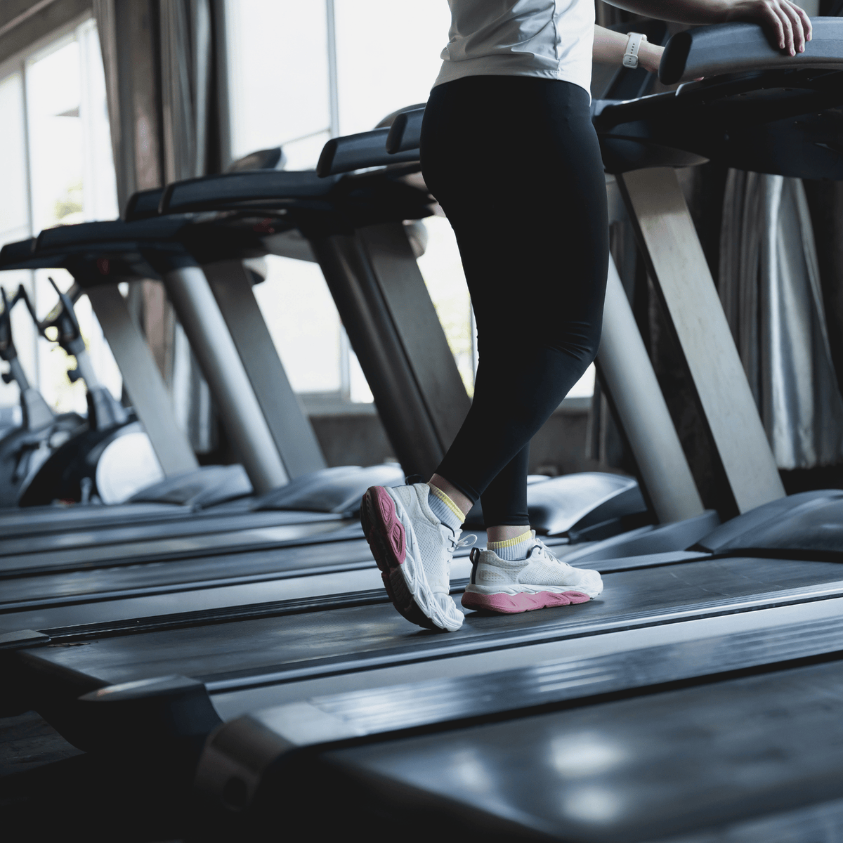 Using a treadmill to exercise.