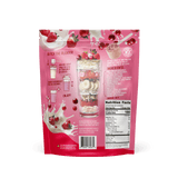 A pink pouch of Shop FlavCity’s Berries & Cream Protein Smoothie shows fruit and a smoothie glass with berries, banana, oats, and powder. The back details instructions, ingredients, and nutrition facts for this collagen or grass-fed whey protein blend.