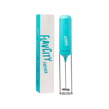 The FlavCity Cafe FlavCity Frother, featuring a blue handheld design with a silver whisk, stands upright beside its matching packaging on a white background—ideal for making barista-style drinks at home.