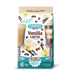 A bag of FlavCity Café Vanilla Latte Powder with images of two vanilla lattes, vanilla flowers, and coffee beans on the front. The packaging highlights All-in-One, Naturally Crafted, and a 32.45 oz net weight.