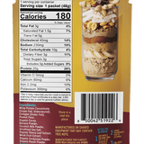 Back of a Shop FlavCity Chocolate Peanut Butter Protein Smoothie Packets box displaying nutrition facts, ingredients list, manufacturer’s details, barcode, and a tall glass showcasing layers of nuts, protein powder, and chocolate pieces.