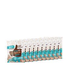A row of Shop FlavCity Plant-Based Coconut Cold Brew Protein Smoothie single-serve packets (10 pack) is arranged side by side, displaying the product name and coconut illustrations on the packaging.