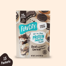 Shop FlavCity Cookies & Cream Protein Smoothie Packets pouch featuring a glass filled with cookies, cream, and banana slices, with text indicating 25g of protein, 10g of collagen, and a 15 Packets label in the corner.