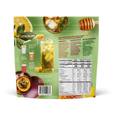 Back view of FlavCity Anytime Essentials Drink Mix Tea pouch showing nutrition facts, ingredients list, preparation instructions, and product branding on a green and white background.