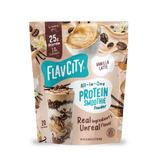 Pouch of Shop FlavCity Vanilla Latte Protein Smoothie powder featuring images of a latte and a layered smoothie, stating 25g of protein and 10g of collagen per serving.