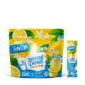 FlavCity Superfood Lemonade powder package with lemon slices and green leaves on a white background
