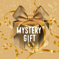 A gold-wrapped box with a gold bow sits amid confetti. "Free Bonus Mystery Gift (up to $39.99 value)" from Shop FlavCity is boldly displayed.