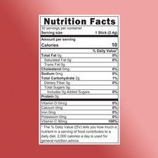 A nutrition facts label on a pink background highlights Shop FlavCity's Grapefruit Lemonade—sugar free with 1 stick (2.4g) serving size, 10 calories, 0g fat, 0mg cholesterol, 0mg sodium, 2g carbs, and 90mg vitamin C—a healthy drink.
