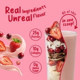 A Shop FlavCity Berries & Cream Protein Smoothie topped with strawberries, cherries, coconut, and banana, featuring 25g grass-fed whey, 10g collagen, and 0g added sugar.