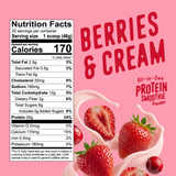 Nutrition Facts label next to a tub of FlavCity Berries & Cream Protein Smoothie powder, with fresh strawberries swirling in a splash of cream.