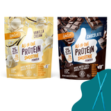 Two Shop FlavCity Fan Favorites All-In-One Protein Smoothie Powders—Vanilla Cream and Chocolate—stand side by side, each with 25g grass-fed whey protein, 11g collagen, plus banana and coconut.
