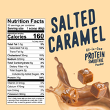 Shop FlavCity Salted Caramel Protein Smoothie nutrition facts label next to grass-fed whey protein powder, a splash of liquid, and three salted caramel cubes.