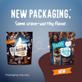 Two packages of Shop FlavCity Chocolate Protein Smoothie are shown side by side—the left displays the previous packaging, while the right highlights the updated design featuring a playful dog illustration. Text reads: “New Packaging, Same crave-worthy flavor—perfect for your next chocolate protein smoothie made with grass-fed whey.”.