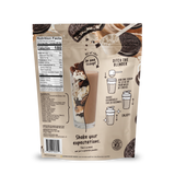 A Shop FlavCity Cookies & Cream Protein Smoothie package displays a Cookies & Cream Protein Smoothie shake, nutrition facts, and illustrated mixing instructions. The text says: Shake your expectations. This is a meal, not just a protein powder—crafted with collagen and premium grass-fed whey for delicious nourishment.