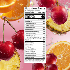 A Shop FlavCity Fruit Punch Electrolyte Mix nutrition facts label surrounded by floating cherries, orange slices, and pineapple chunks with splashes of water on a pink background.