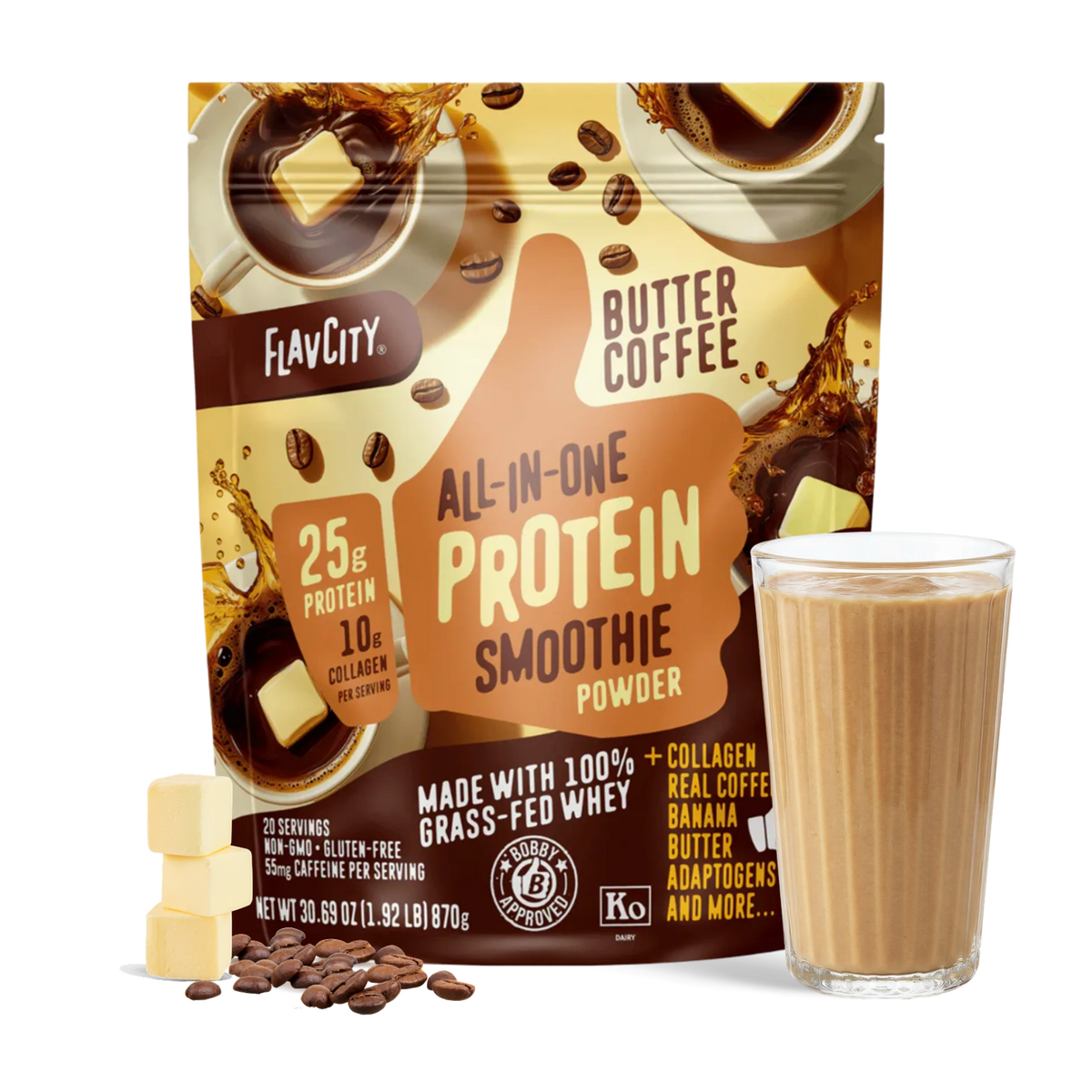 A bag of Shop FlavCity Butter Coffee Protein Smoothie stands behind a glass filled with a rich brown smoothie. Coffee beans and cubes of butter are artfully arranged in front, highlighting this delicious protein smoothie blend.
