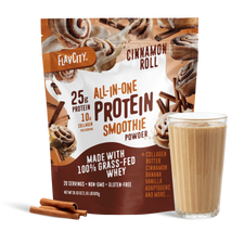 A bag of Shop FlavCity Cinnamon Roll Protein Smoothie stands behind a glass of smoothie and two cinnamon sticks, with images of cinnamon rolls and cinnamon sticks on the packaging.