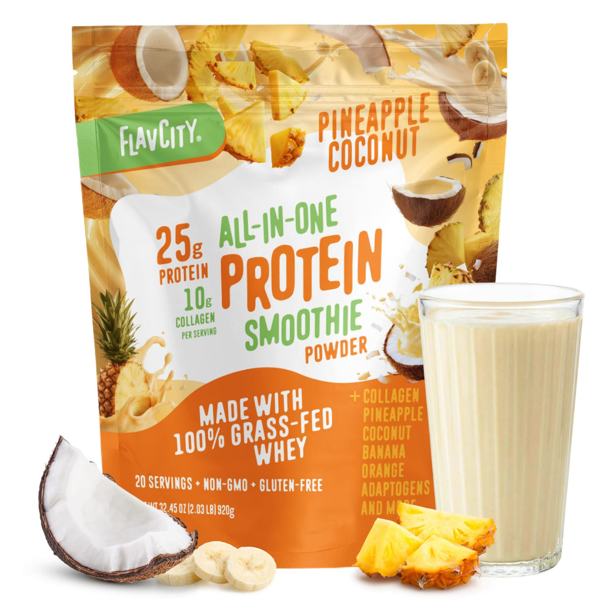 A bag of Shop FlavCity Pineapple Coconut Protein Smoothie powder stands behind a filled glass, with coconut, banana, and pineapple pieces in front. The packaging highlights collagen protein and grass-fed whey protein content.