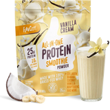 A pouch of Shop FlavCity Vanilla Cream Protein Smoothie sits next to a glass of vanilla protein smoothie, banana slices, coconut, and a vanilla flower, highlighting its grass-fed whey content and premium ingredients.