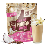 Shop FlavCity Vanilla Latte Protein Smoothie powder with coffee beans, coconut, and a glass of smoothie garnished with a vanilla flower; highlights include 25g protein and collagen per serving from grass-fed whey.