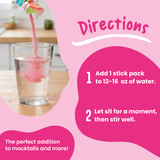 A stick pack of FlavCity Strawberry Limeade Electrolyte Mix pours pink powder into a glass of water; add one stick pack to 12-16 ounces of water and stir well.