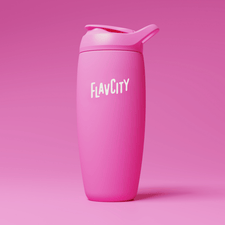 A pink reusable tumbler with a flip-top lid and the word FLAVCITY printed in white on the front, set against a matching pink background.