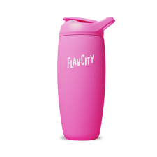 The Shop FlavCity Shaker Bottle is a bright pink insulated tumbler with a white FLAVCITY logo and flip-top lid, designed for lump-free shakes. It's shown on a plain white background.