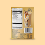 Back of a Shop FlavCity Salted Caramel Protein Smoothie packet showing the nutrition facts, ingredients list, and a small illustration of a drink in a glass.