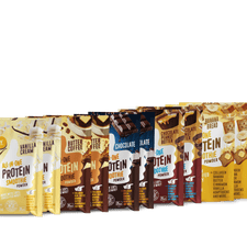 A row of Shop FlavCity Protein Smoothie 10 Single-Serve packets in flavors like Vanilla Cream, Butter Coffee, Chocolate, Chocolate Peanut Butter, and Banana Bread displayed side by side against a white background.