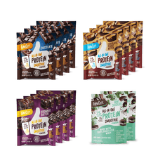 Four pouches of Shop FlavCity's Try-It Kit: Chocolate Lovers Deluxe Sampler are displayed on a white background, featuring Chocolate, Chocolate Batter, Brownie Batter, and Chocolate Cookie flavors—all with grass-fed whey.