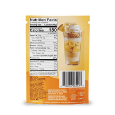 Back of Shop FlavCity’s Protein Smoothie Single-Serve Pineapple Coconut packet displays nutrition facts, barcode, and a parfait suggestion with bananas, granola, coconut, and pineapple. Manufacturer info is at the bottom.