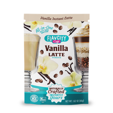 A package of FlavCity Cafe Latte Variety Pack features vanilla flowers, coffee beans, and two latte glasses. The text highlights it as an all-in-one, instant latte assortment in single-serving packets for indulgent, naturally crafted lattes.