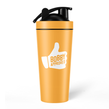 Orange shaker bottle with a black lid, displaying a white thumbs-up graphic and the text ‘Bobby Approved’ on the front, set against a white background.